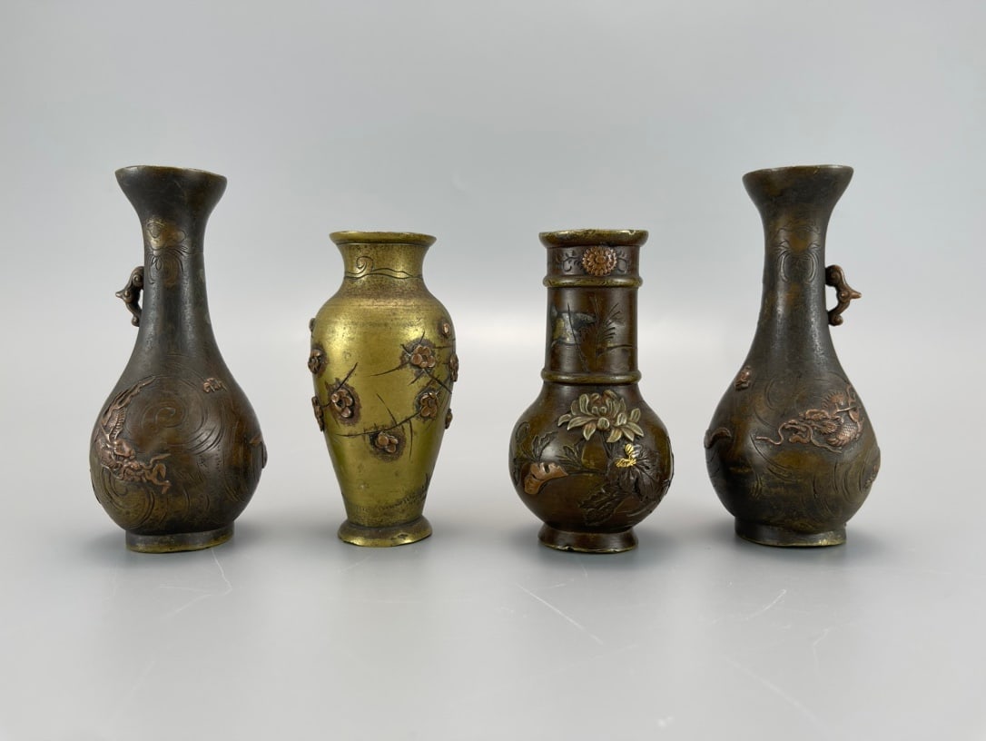 A GROUP OF BRONZE AND BRASS MINIATURE VASES (1 of 4)