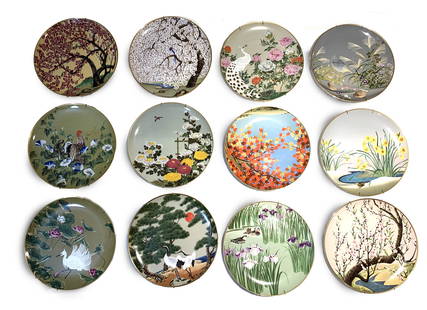PORCELAINE FRANKLIN MINT - NAOKA NOBATA: Série complète de 12 assiettes décoratives en porcelaine fine, avec liséré d’or 24 carats. Collection Oiseaux et Fleurs de Franklin Mint, dessinée par