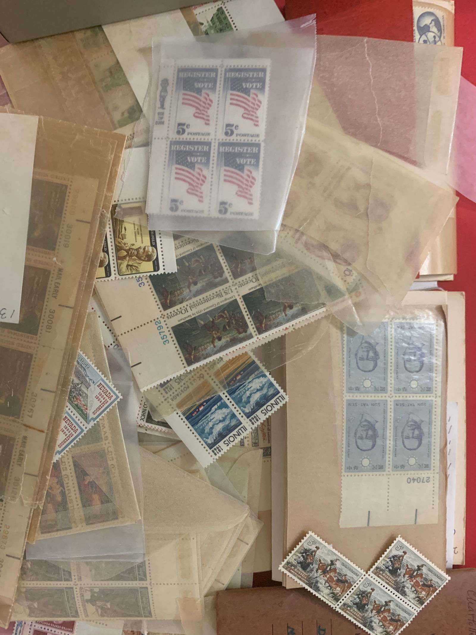 Stamps, Box with a collection of mint USA stamps, , including a small stock book,: Stamps, Box with a collection of mint USA stamps, , with small stock book , most of the stamps with its original gum but it stuck in the wax paper . But in gereral all the stamps are in good condition