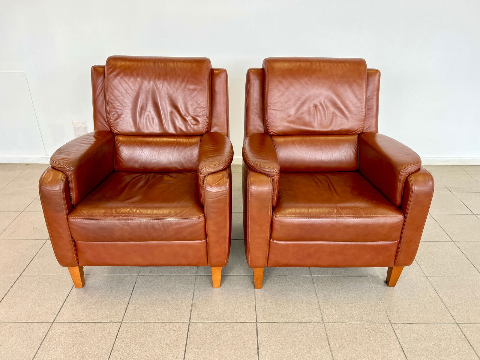 PAIR DUTCH COGNAC LEATHER ARMCHAIRS (1 of 11)
