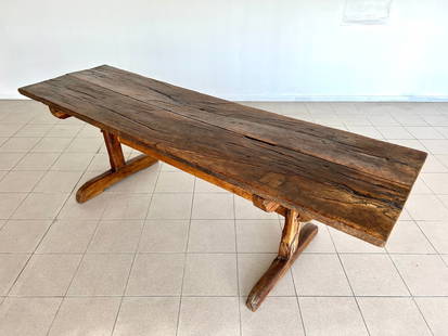 RARE ANTIQUE FRENCH FARMHOUSE TABLE, 17C or earlier: Dimensions: H 30.5” x W 92.5” x D 28”. Rare Antique 17C or earlier Farmhouse dining table, French or French Swiss. Standing on two block feet connected by central stretcher. 068
