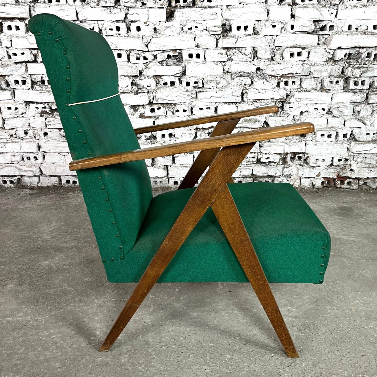 SCANDINAVIAN EASY CHAIR, 1970S: Dimensions: H 34.5” x W 23” x SD 20.5” x SH 15.3”. Scandinavian Easy chair, upholstered in original green fabric with nail trim finish on back, from 1970s. 0173