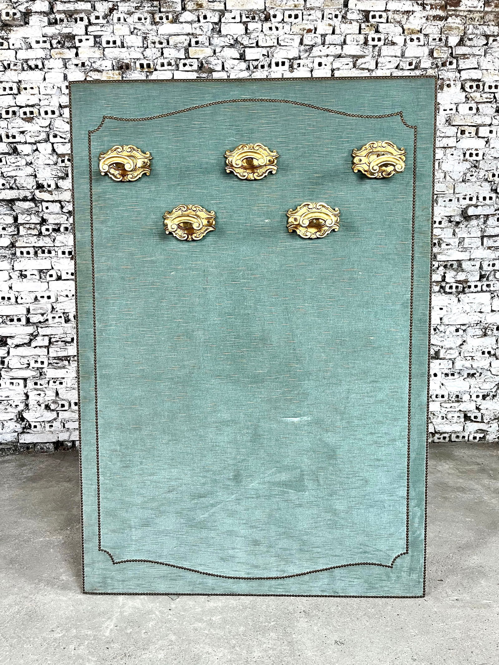 ANTIQUE ITALIAN COAT STAND: Dimensions: H 71.7" x W 49.2". Antique Italian coat stand, covered in original blue velvet with 5 bronze hangers and nail trim detail. 012