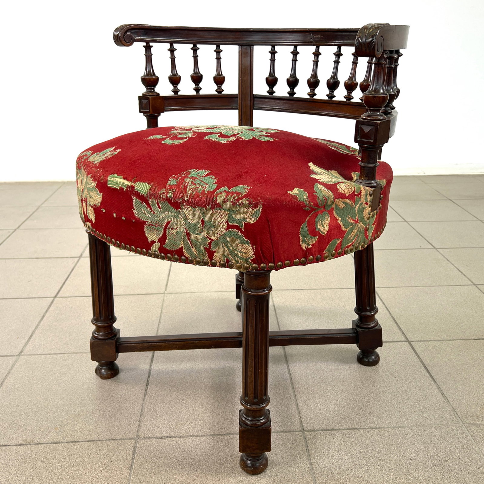 VICTORIAN STYLE MAHOGANY CHAIR: Dimensions: H 28" x W 25" x D 22" x SH 20.5". Victorian style carved mahogany chair with original red fabric with flower detail. 045