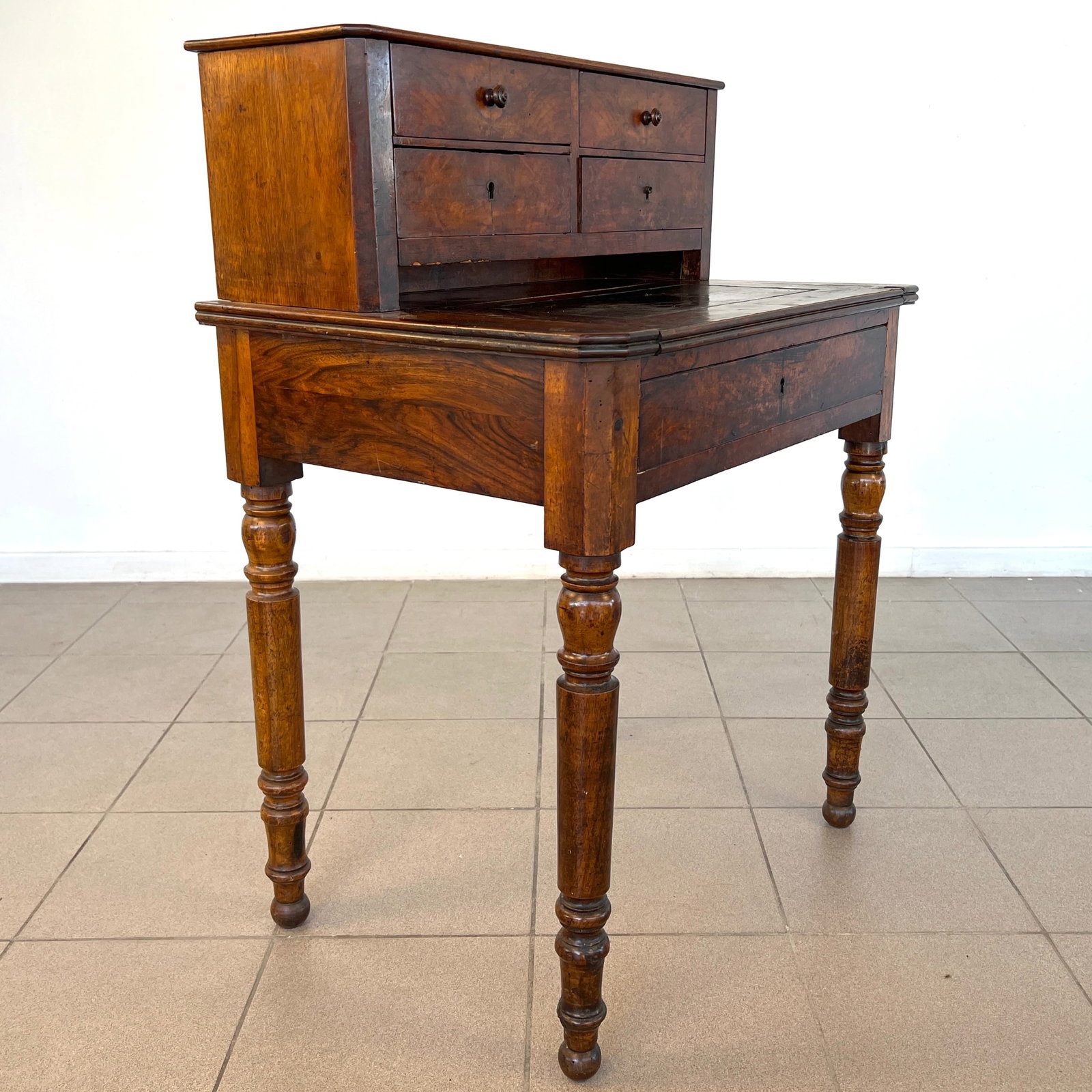 ANTIQUE FRENCH SECRETARY DESK: Dimensions: H 38.5"/29" x W 27.7" x D 20". Antique French secretary desk with 4 small drawers and one big drawer under the top. 048