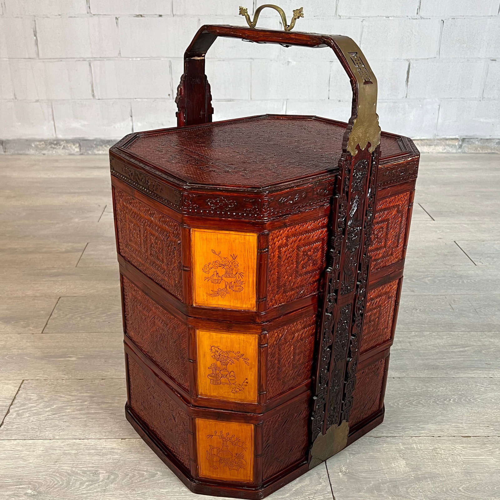 OCTAGONAL CHINOISERIE STORAGE BASKET: Dimensions: H (whit handle) 30.7” (base 23”) x W 16.2” x D 19.4”. Octagonal shaped Chinese Late Qing Dynasty replica three-tiered basket. Traditional wedding basket with separa