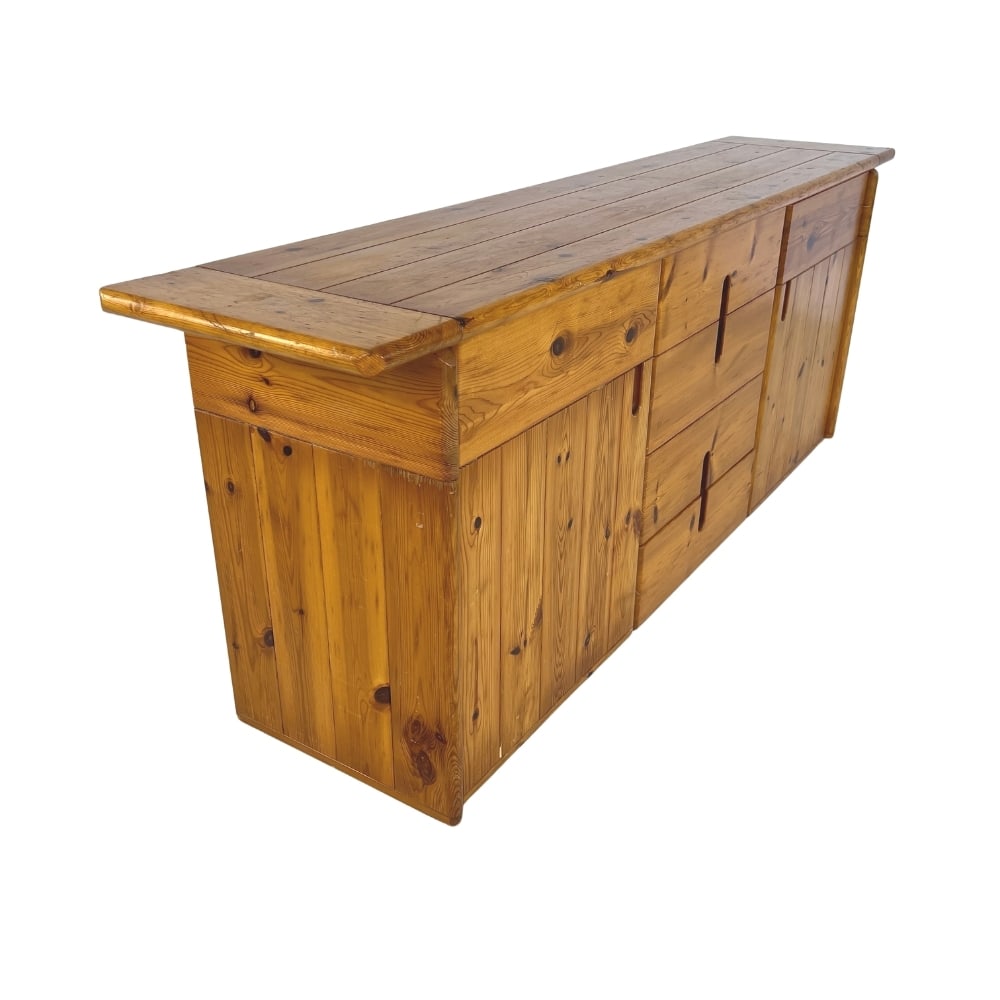 PINE CREDENZA BY SILVIO COPPOLA, 1960S: Dimensions: H 30” x W 81.5” x D 17.7”. Brutalist pine wood Credenza by Silvio Coppola with 4 small drawers and two doors on both sides with one central shelf.
