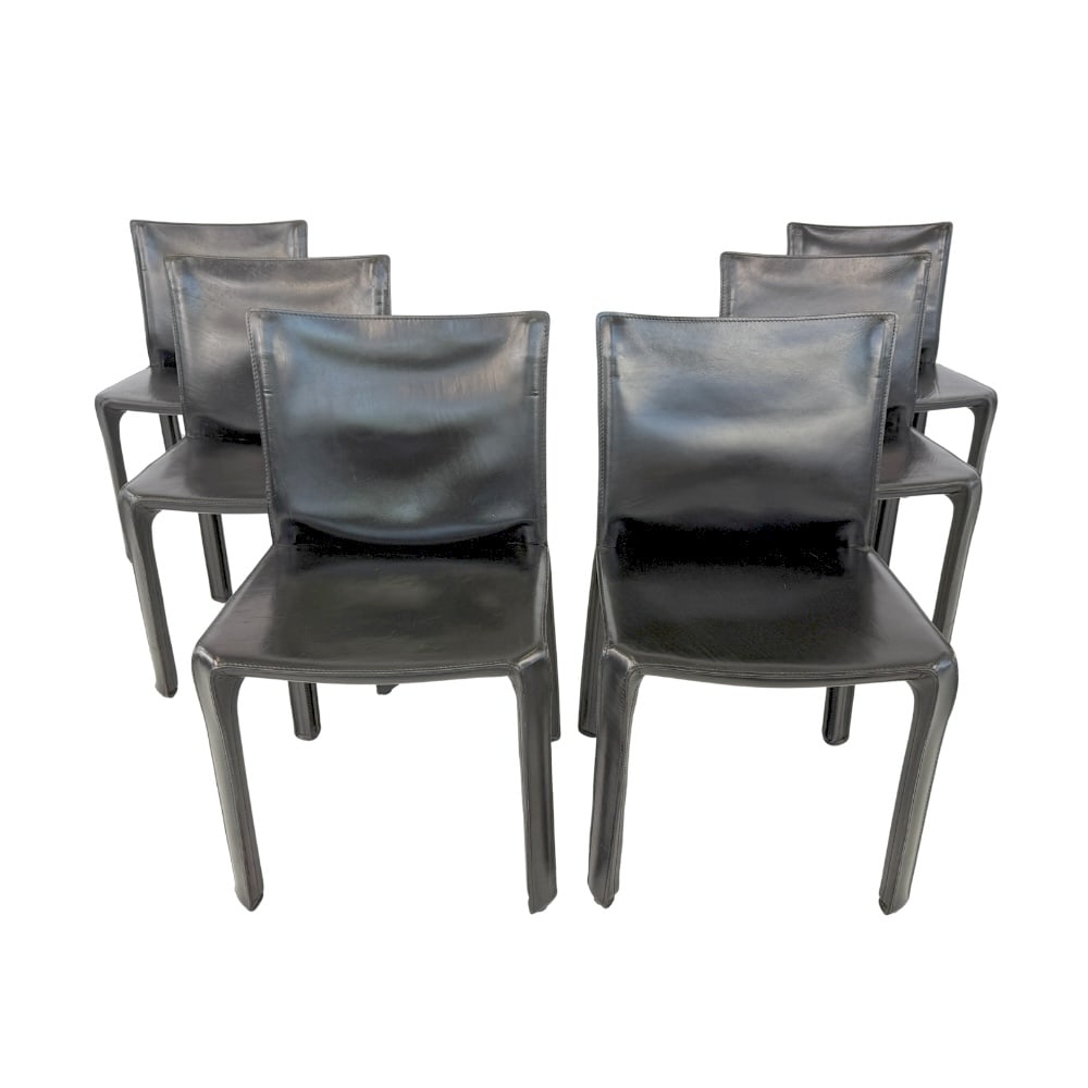 (6) CAB 412 DINING CHAIRS BY MARIO BELLINI FOR CASSINA,1990s: Dimensions: H 32.3” x W 20.5” x D 18.5”. Set of 6 Cab 412 black leather dining chairs by Mario Bellini for Cassina.