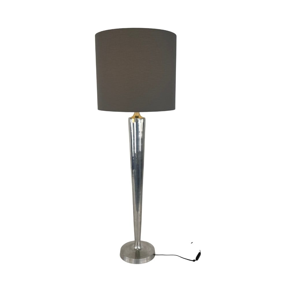 VINTAGE CHROMED TALL LAMP: Dimensions: H 33.5” x W (base) 7.7”. Vintage chromed tall table or floor lamp with grey lampshade.