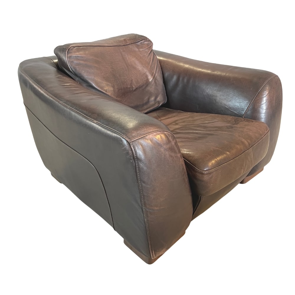 ITALIAN VINTAGE LEATHER LOUNGE CHAIR: Dimensions: H 25.9" x W 47” x D 45” x SH 16”. Vintage Italian brown leather lounge armchair with removable cushions by Incanto.