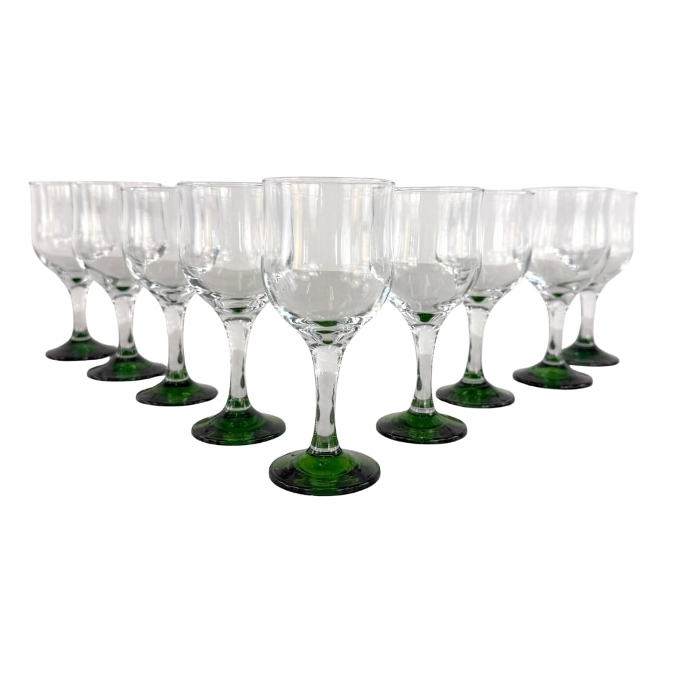 (9) EMERALD GREEN CRYSTAL WINE GLASSES: Dimensions: H 6.7”/6.5” x W 2.7”/ 3.5”. Set of 9 Emerald green crystal wine glasses. Two of the glasses are smaller.