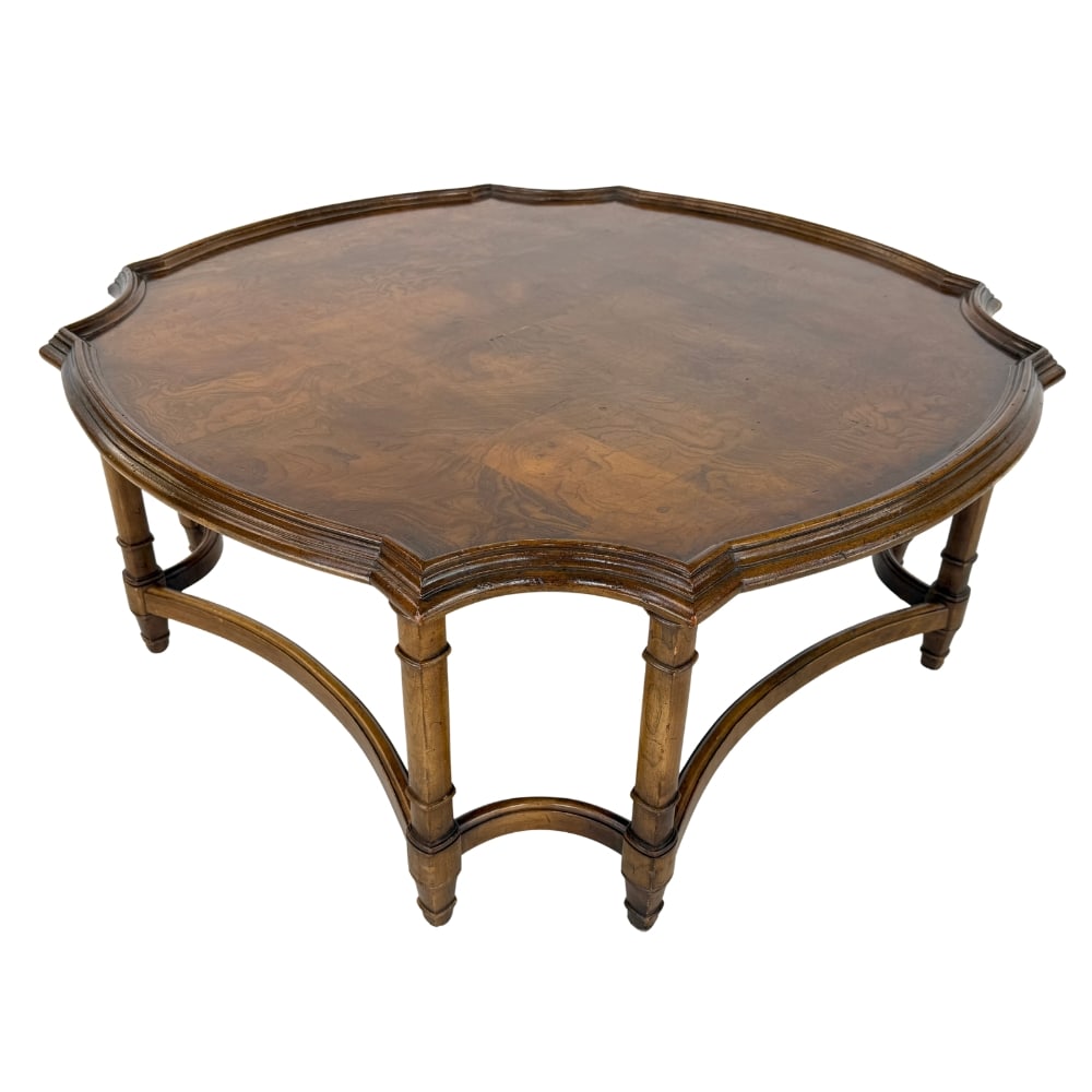 FRENCH COFFEE TABLE: Dimensions: H 17.3” x W 39.7”. French coffee table with 8 legs conjoined with curving stretchers.