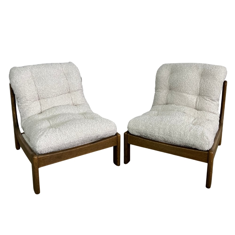 (2) BRUTALIST LOUNGE CHAIRS ATTR. TO CARL STRAUB: Dimensions: H 31.5” x W 28.3” x SD 21.5” x SH 17”. Pair of Brutalist lounge chairs attr. to Carl Straub, newly upholstered in off-white boucle.