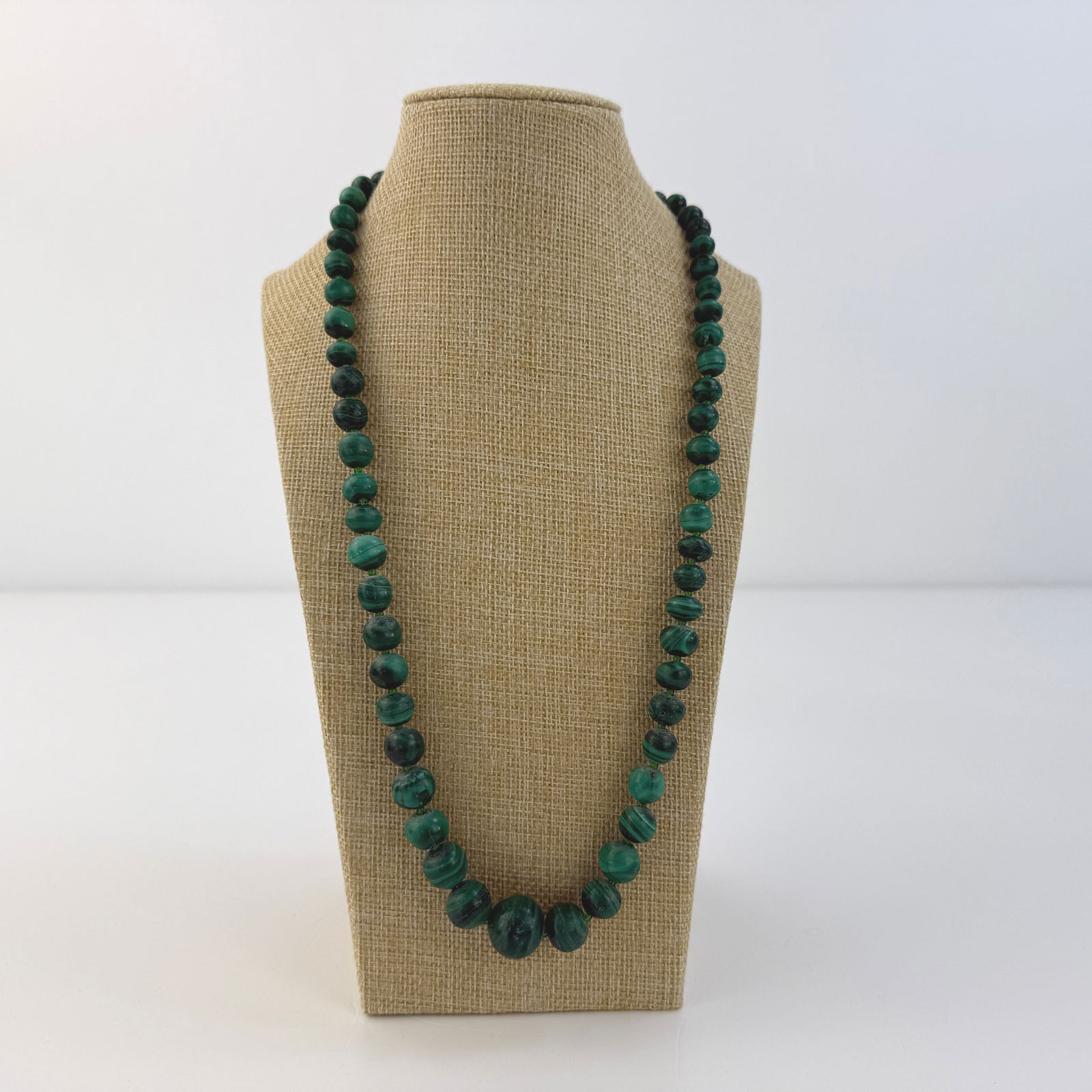 MALACHITE NECKLACE: Dimensions: W 11.5”. Natural Malachite beaded necklace.