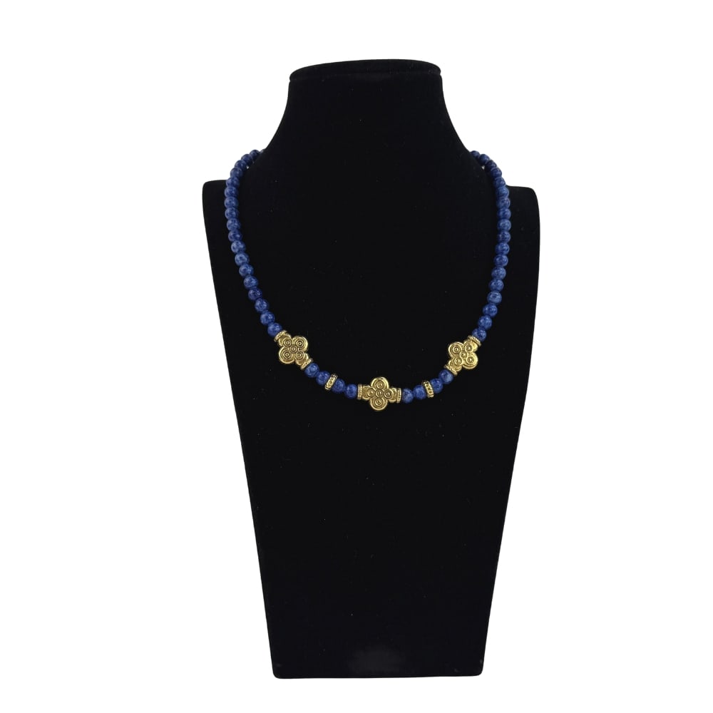 LAPIS LAZULI NECKLACE: Dimensions: W 8”. Lapis Lazuli beaded necklace with gold-toned accents.