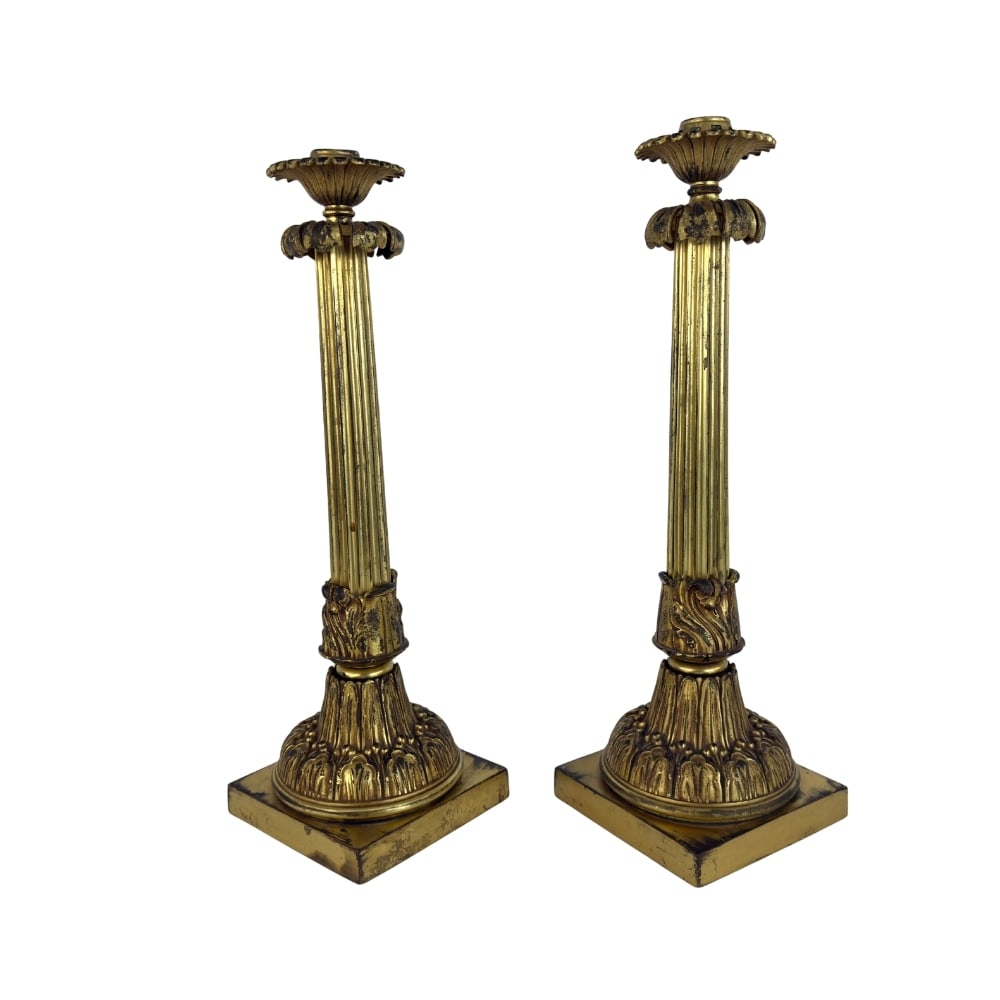 FRENCH EMPIRE STYLE CANDLESTICKS, A PAIR: Dimensions: H 17.5” x W 5.5”. Pair of Antique French Empire style bronze column candle holders.