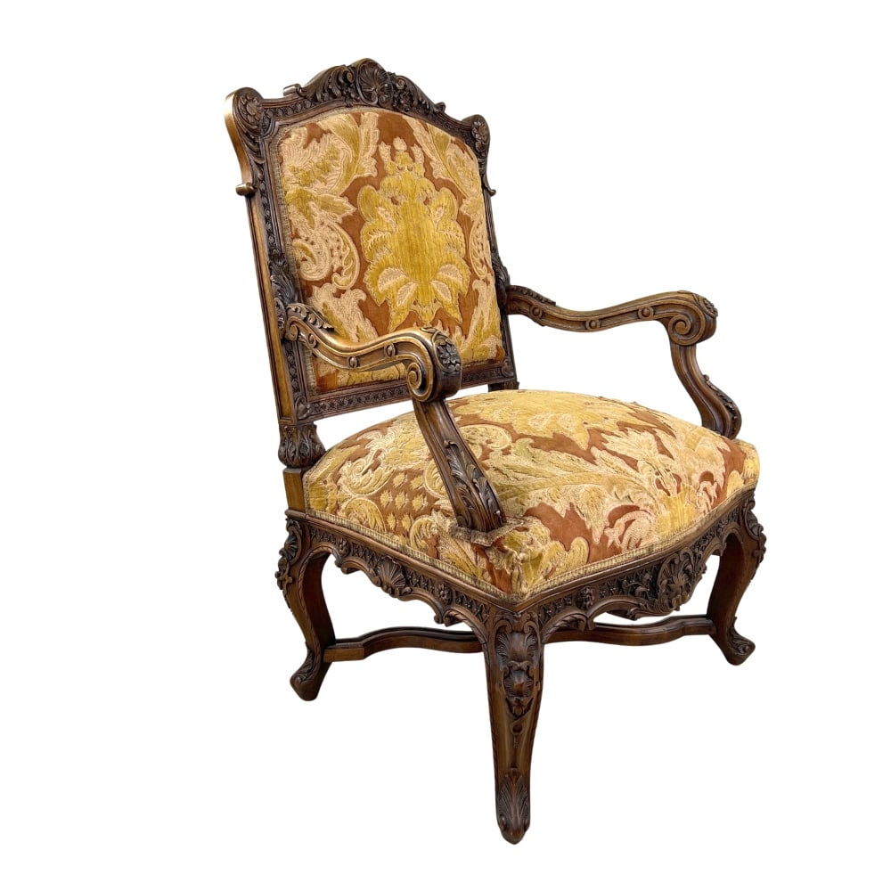 19C HEAVILY CARVED FRENCH WALNUT LOUIS XIV ARMCHAIR: Dimensions: H 41.5" x W 28" x D 25" x SH 19.5". Very fine, heavily carved French Louis XIV style armchair with original upholstery.