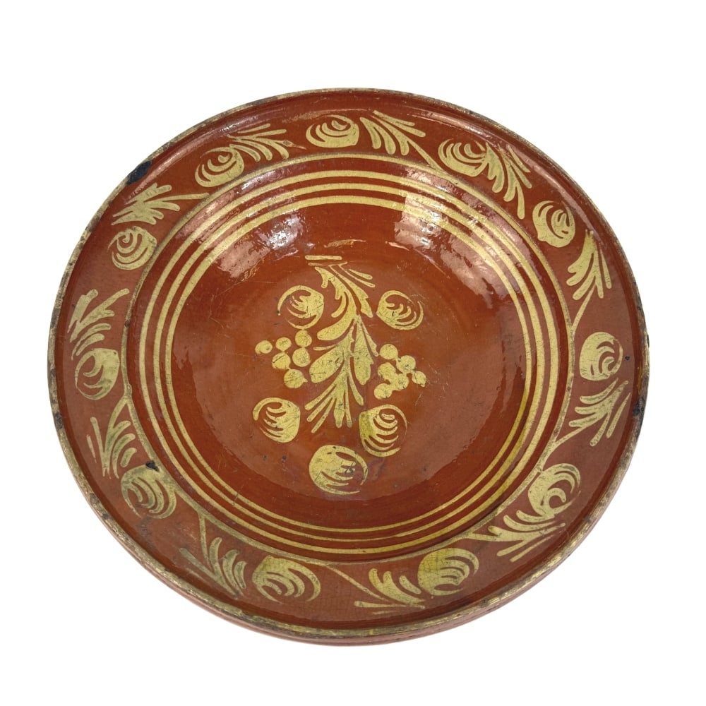 ANTIQUE POTTERY BOWL: Dimensions: H 3.5” x W 15”. Antique pottery bowl, hand painted with floral pattern.