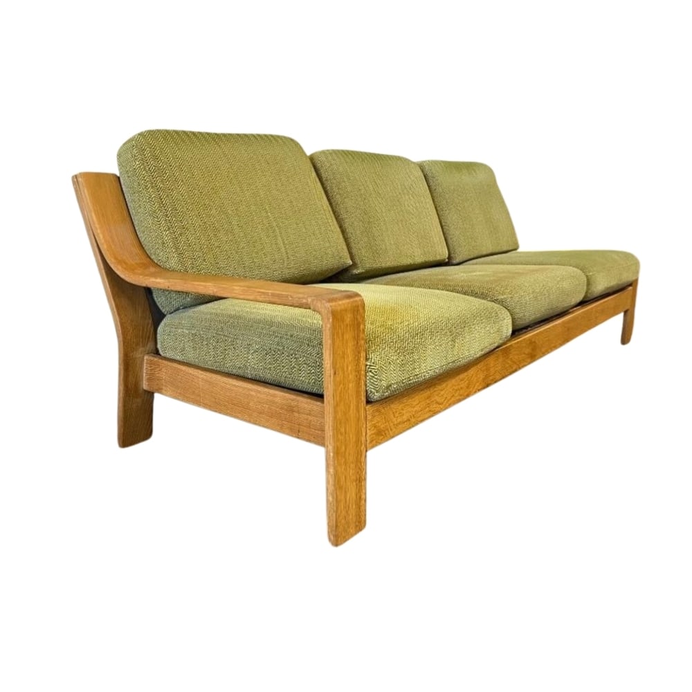 DANISH THREE-SEATER SOFA MANNER OF HOLSTEBRO: Dimensions: H 31.4” x W 120” x D 30.7”. Vintage Danish three-seater sofa with original light green mohair upholstery.
