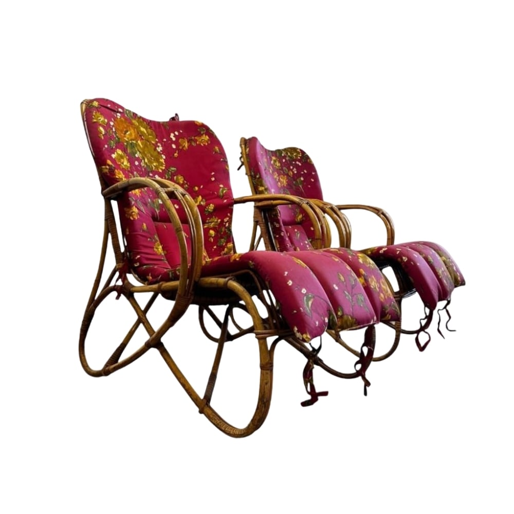 ROHE NOORDWOLDE RATTAN CHAIRS, A PAIR: Dimensions: H 31.4” x W 26.3” x D 27.5”. Pair of Vintage rattan easy chairs by Rohe Noordwolde, from 1960s with original red floral cushions.