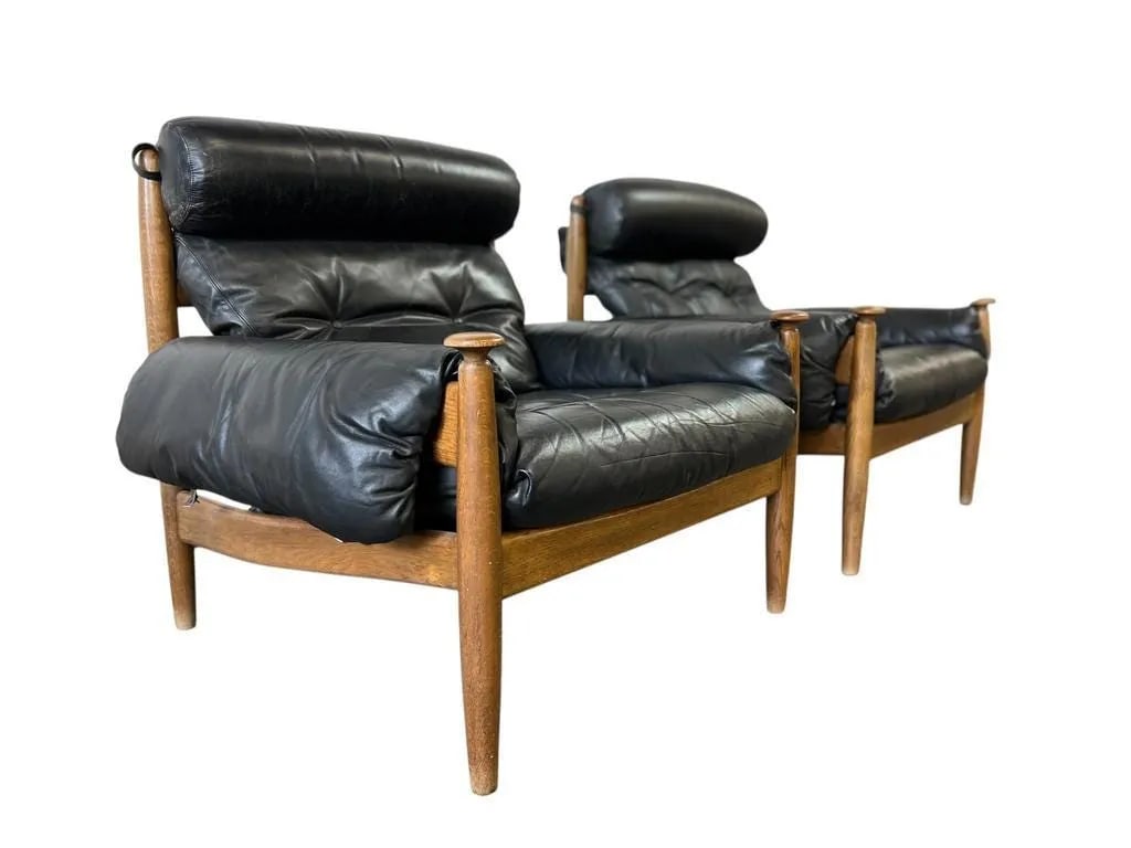 SWEDISH ARMCHAIRS BY ERIC MERTHEN, A PAIR: Dimensions: H 34.6” x W 37” x D 36.6”. Pair of Vintage Swedish armchairs designed by Eric Merthen for Ire Mobler. Upholstered in original black leather.