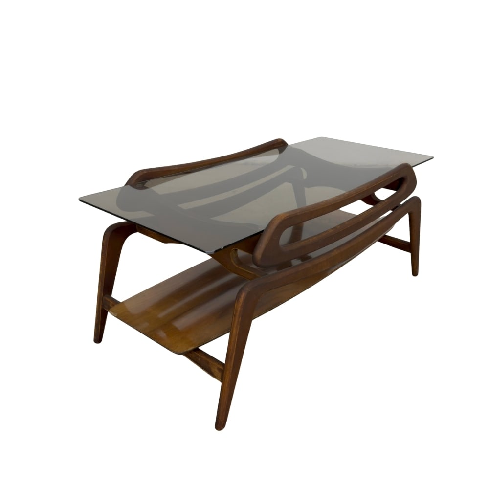 COFFEE TABLE ATTR. TO LOUIS VAN TEEFFELEN: Dimensions: H 16.5” x W 39.5” x D 20”. Vintage coffee table attr. to Louis Van Teeffelen for Webe with glass top and lower shelf.