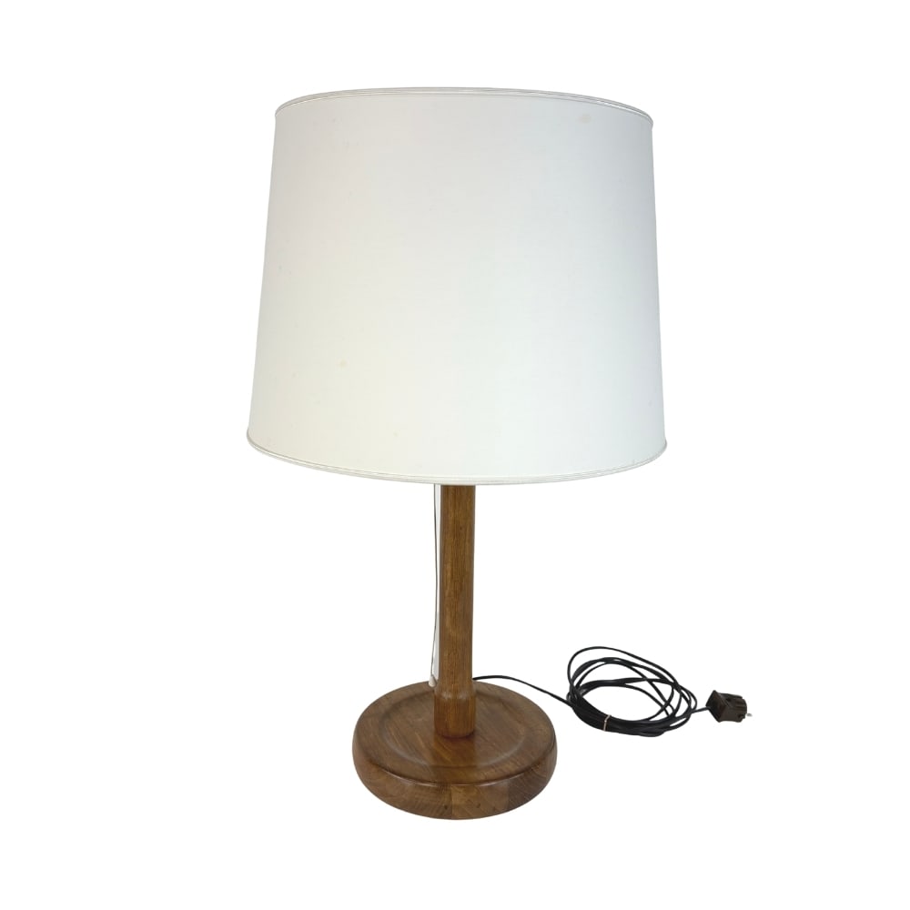 DANISH TABLE LAMP: Dimensions: H 30.3” x W 9.5”. Vintage Danish table lamp with wooden base and white fabric lampshade.