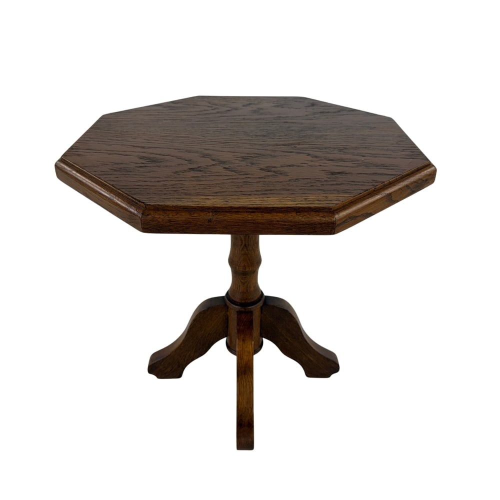 OAK OCTAGONAL SIDE TABLE: Dimensions: H 19.5” x W 19.5”. Vintage oak octagonal coffee or side table.