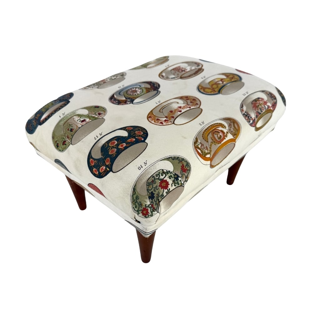 VINTAGE FRENCH FOOT STOOL: Dimensions: H 10.5” x W 15.5” x D 11.5”. Vintage designer foot stool with original upholstery.