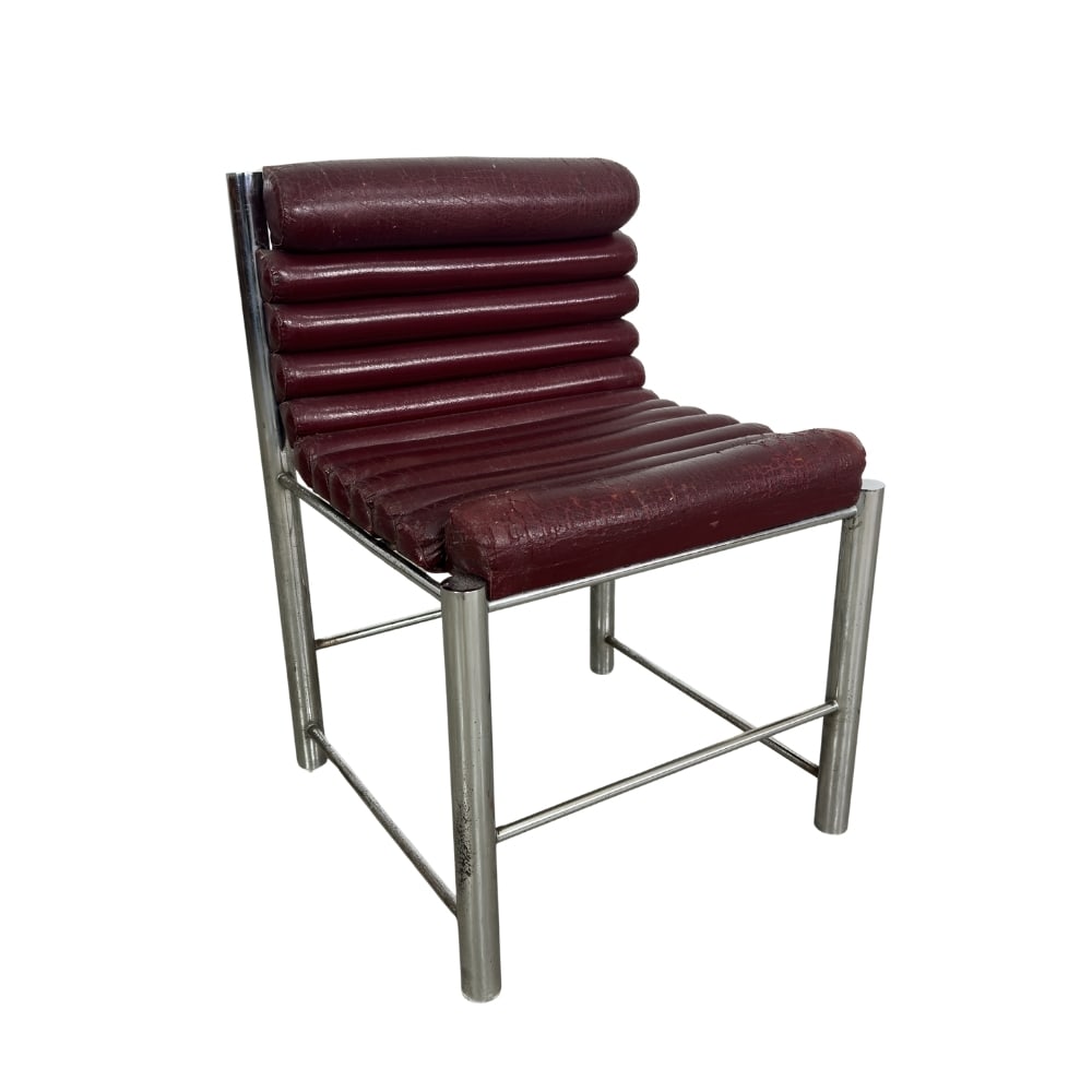 JOE CESARE COLOMBO ITALIAN CHAIR: Dimensions: H 30” x W 21” x SD 16.5” x SH 19”. Vintage Italian chair in burgundy faux leather and chrome-plated frame designed by Joe Cesare Colombo.