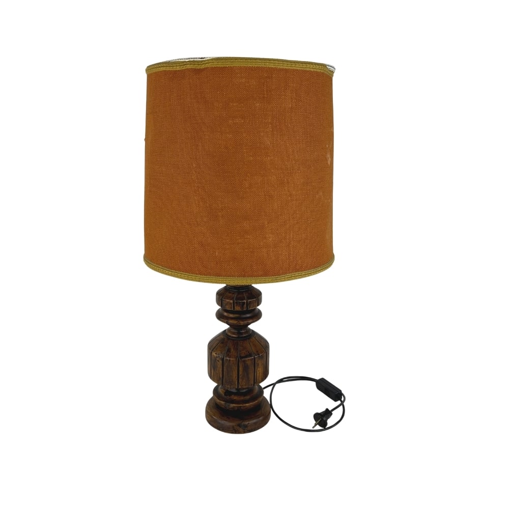 VINTAGE FRENCH TABLE LAMP: Dimensions: H 29” x W 14”. Vintage French table lamp with carved wood base and orange fabric lampshade.