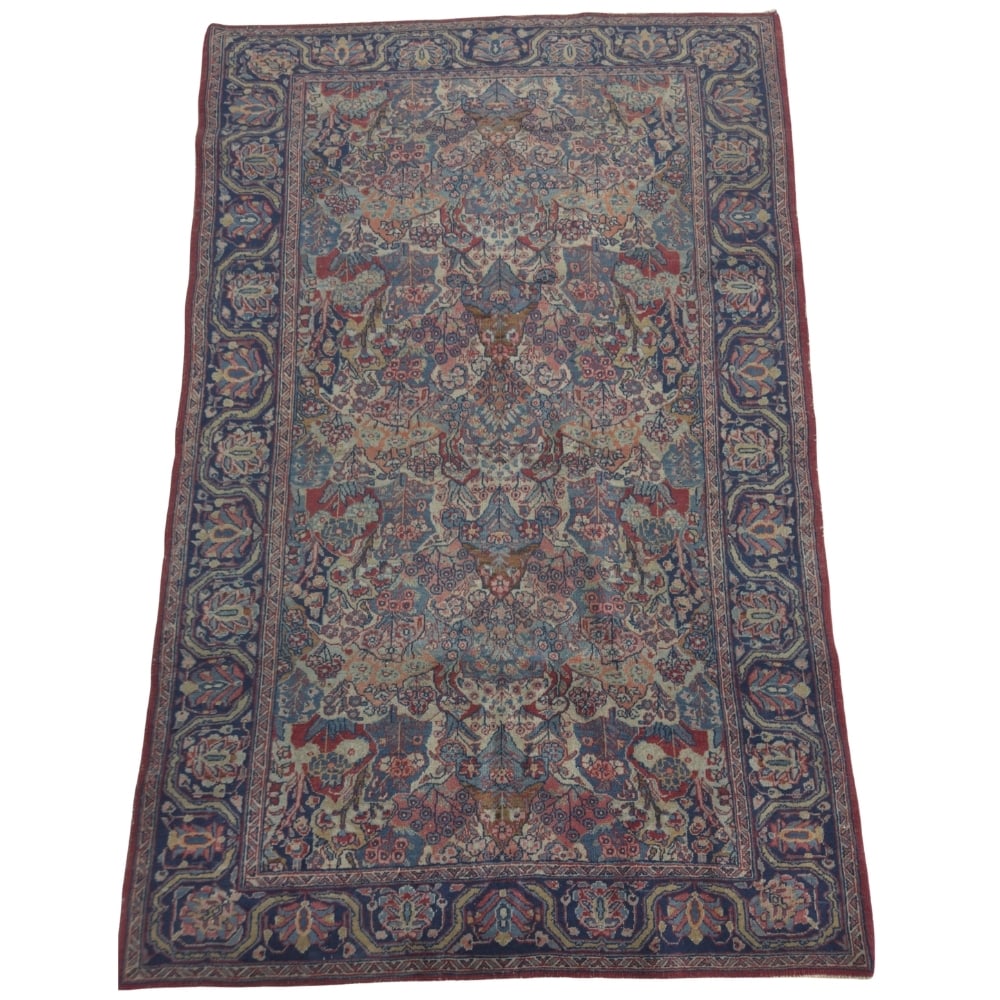 HAND-KNOTTED PERSIAN WOOL RUG: Dimensions: H 82” x W 50”.