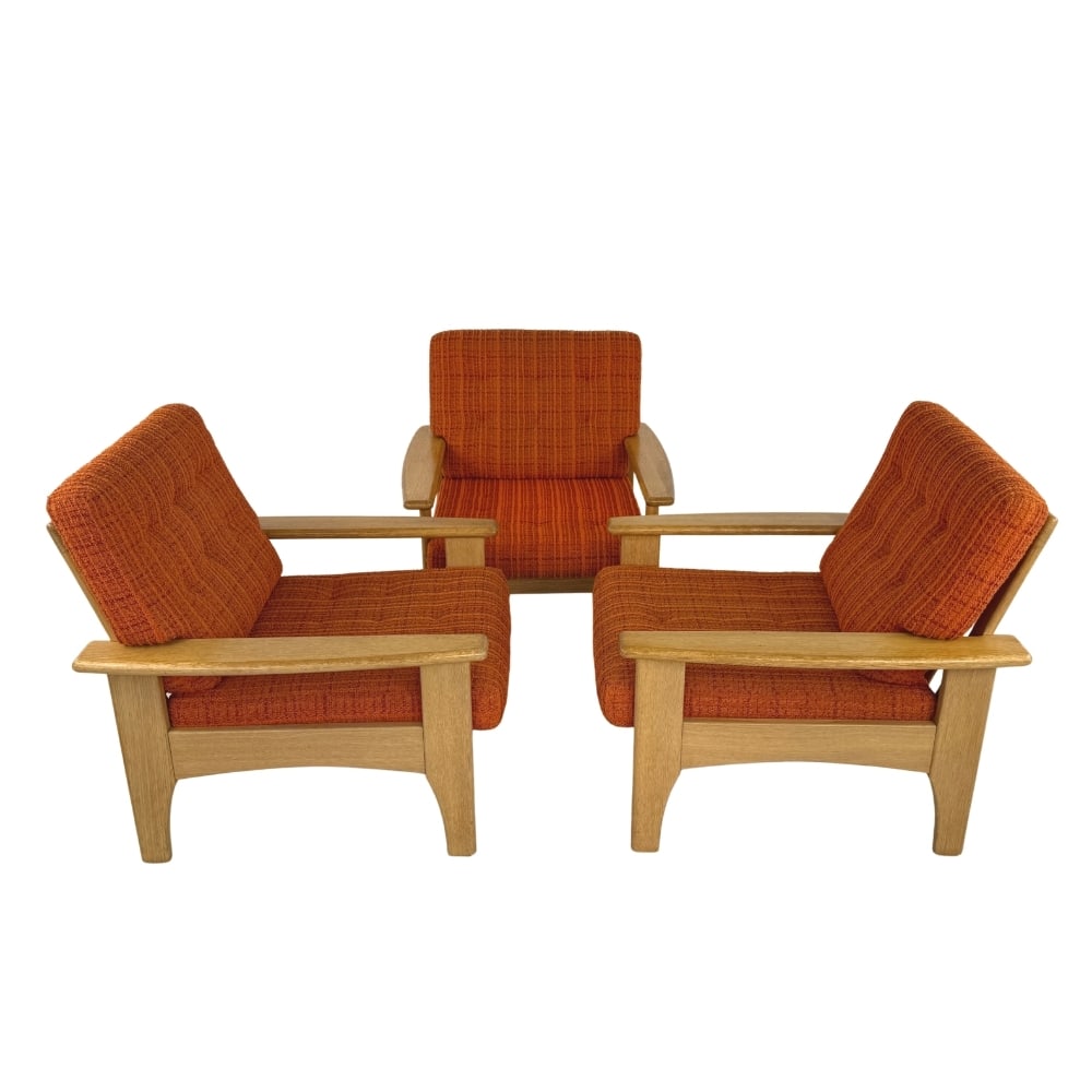 (3) SCANDINAVIAN TEAK EASY CHAIRS, 1960s: Dimensions: H 32” x W 31.5” x D 32” x SH 16. Set of 3 Mid-Century Modern teak easy chairs with original boucle upholstery and loose padded cushions.