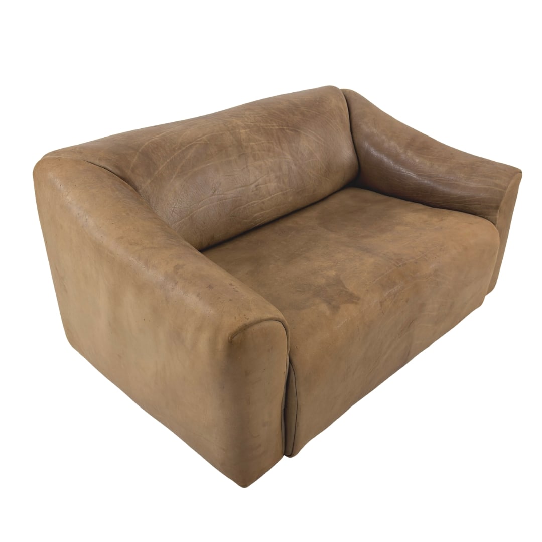 DE SEDE DS 47 EXTENDABLE SOFA: Dimensions: H 29” x W 54.5” x D 35”. De Sede DS 47 extendable two-seater sofa in brown buffalo leather.