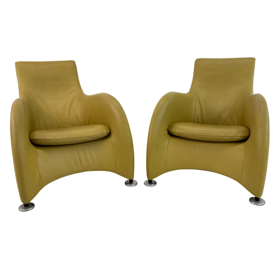 MONTIS LOGE ARMCHAIRS, A PAIR: Dimensions: H 32.5” x W 29” x D 41.5” x SH 15.7”. Pair of Vintage Montis loge chairs in yellow leather designed by Gerard van den Berg in the 1980s.