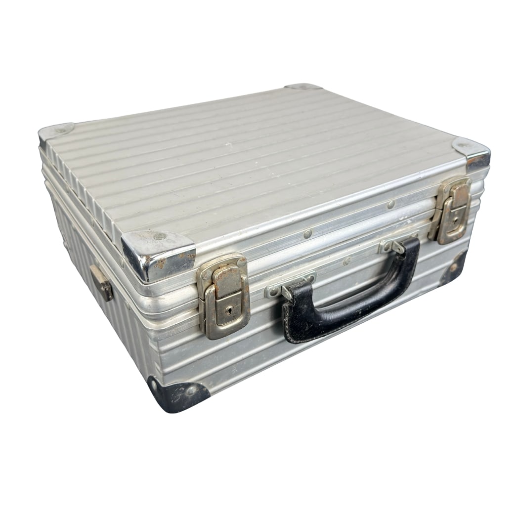RIMOWA ALUMINUM CABIN SUITCASE: Dimensions: H 6.5” x W 14” x D 12”. Vintage Classic Rimowa silver aluminum cabin suitcase.