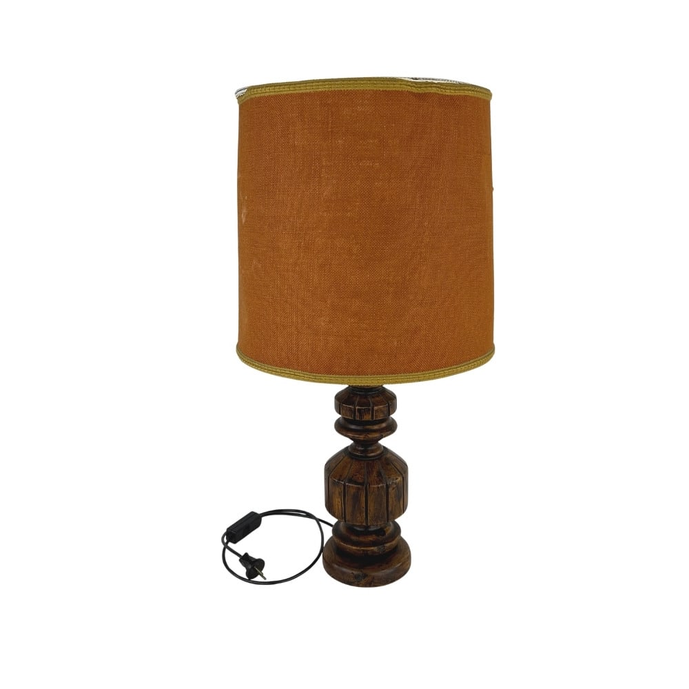 VINTAGE FRENCH TABLE LAMP: Dimensions: H 29” x W 14”. Vintage French table lamp with carved wood base and orange fabric lampshade.