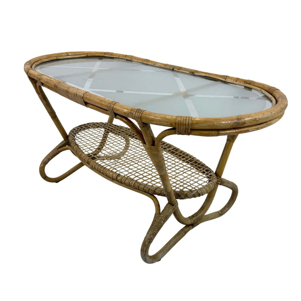 BAMBOO AND RATTAN COFFEE TABLE BY ROHE NOORDWOLDE: Dimensions: H 20.7” x W 41.5” x D 20”. Vintage bamboo and rattan coffee table designed by Dirk Van Sliedrecht for Rohe Noordwolde with glass top and a lower shelf.