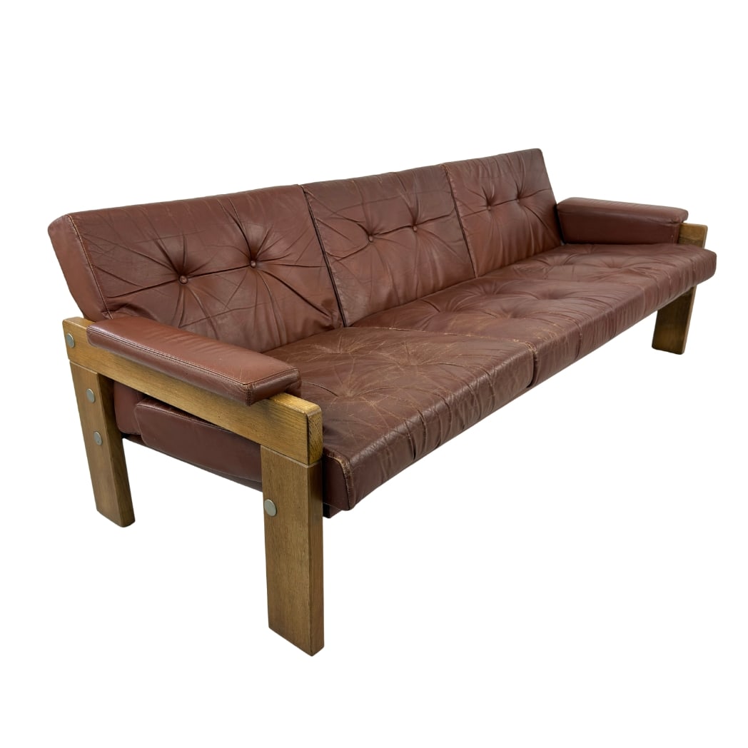 MARTIN VISSER FOR SPECTRUM THREE-SEATER SOFA: Dimensions: H 27.5” x W 79.5” x D 30.5” x SH 17”. Vintage brown leather and wenge three-seater sofa designed by Martin Visser for Spectrum 1960s.