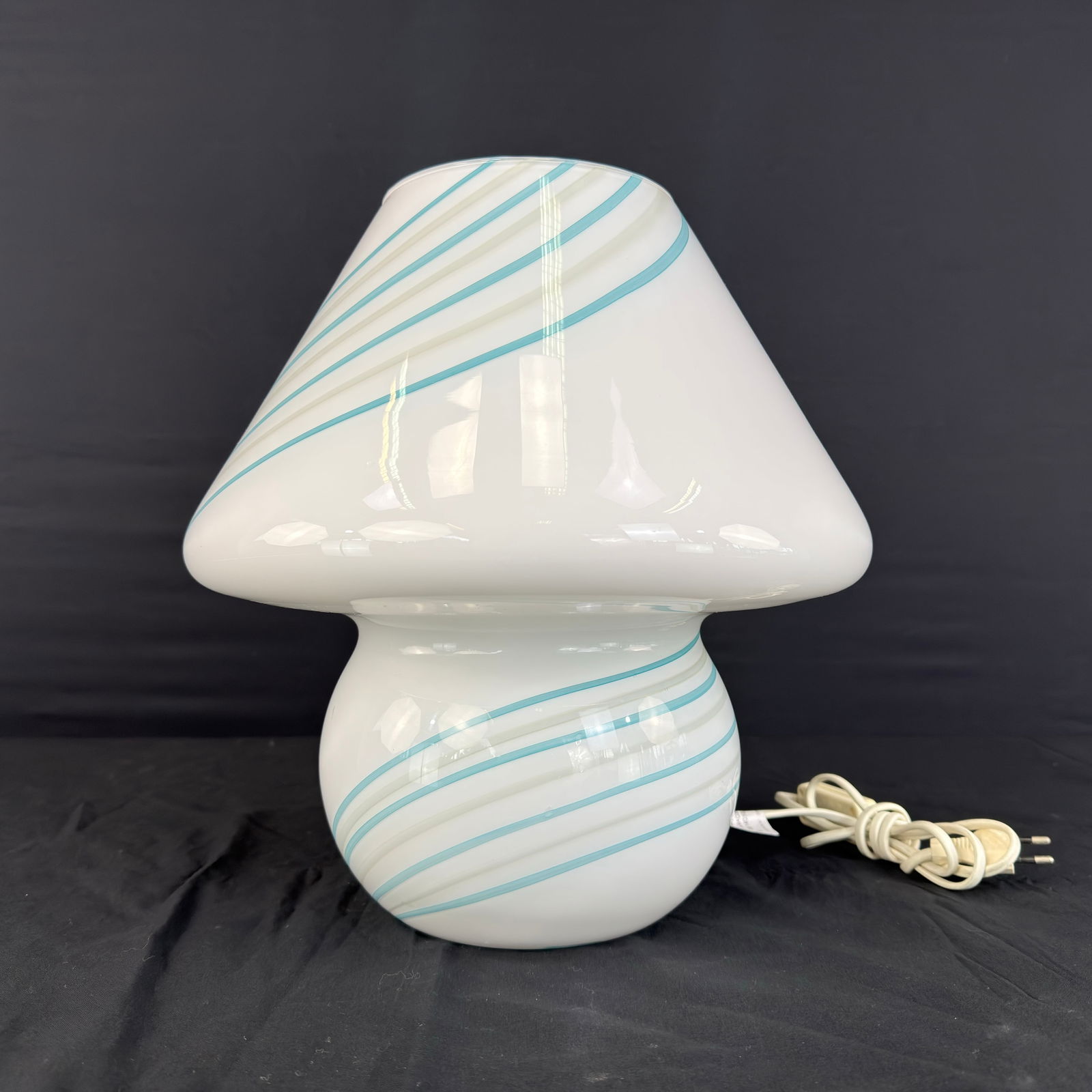 MURANO MUSHROOM TABLE LAMP: Dimensions: H 14.3” x W 12.5”. Italian Murano glass mushroom table lamp handmade in the 1970s with hand blown white glass with blue and grey spiral stripes.