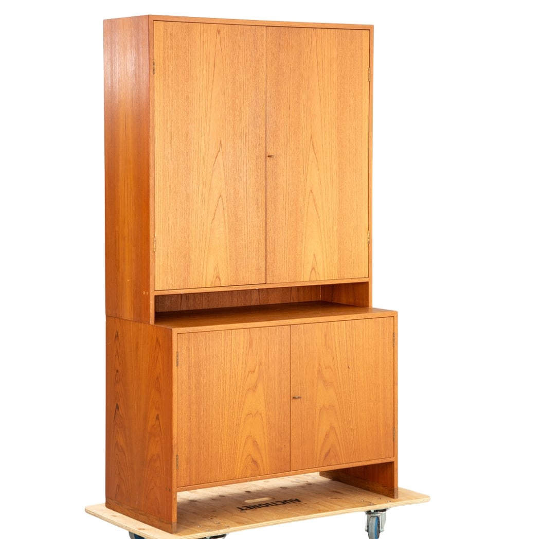 HANS J. WEGNER CABINET, 1960s: Dimensions: H 70.8” x W 39.3” x D 19.6”. Danish 2-door cabinet designed by Hans J. Wegner for Ry Mobler, veneered in teak with oak blades.