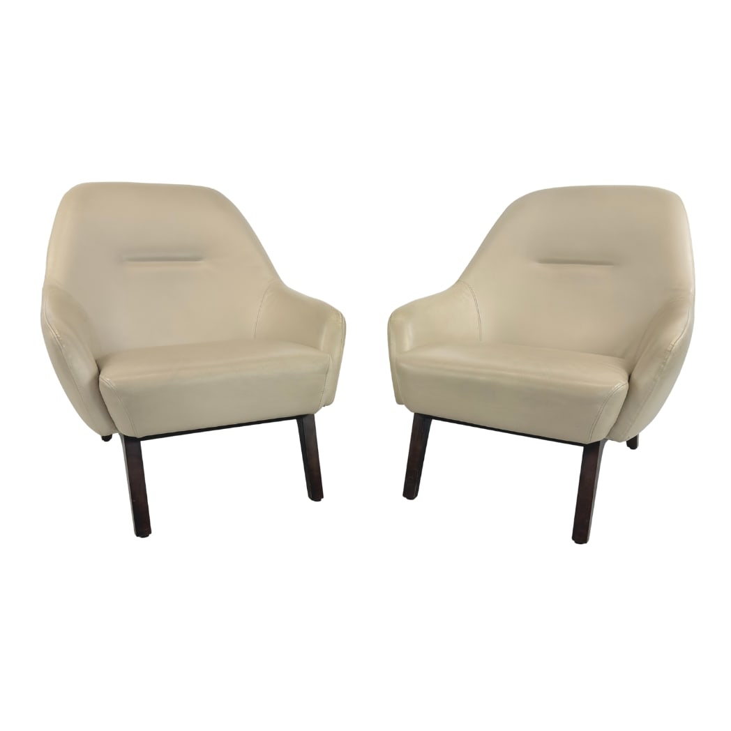 ADAM COURT LEATHER ARMCHAIRS, A PAIR: Dimensions: H 32” x W 29.5” x D 36” x SH 16”. Pair of Vintage Nate armchairs designed by Adam Court, upholstered in original beige leather.