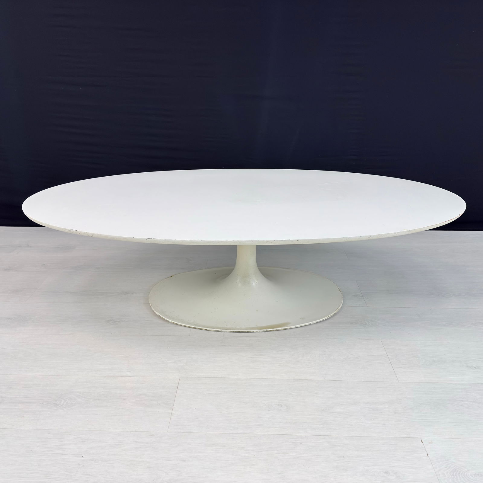 COFFEE TABLE AFTER EERO SAARINEN TULIP: Dimensions: H 15” x W 55.5” x D 29.7”. Oval Tulip coffee table by Arkana in the style of Eero Saarinen for Knoll International.
