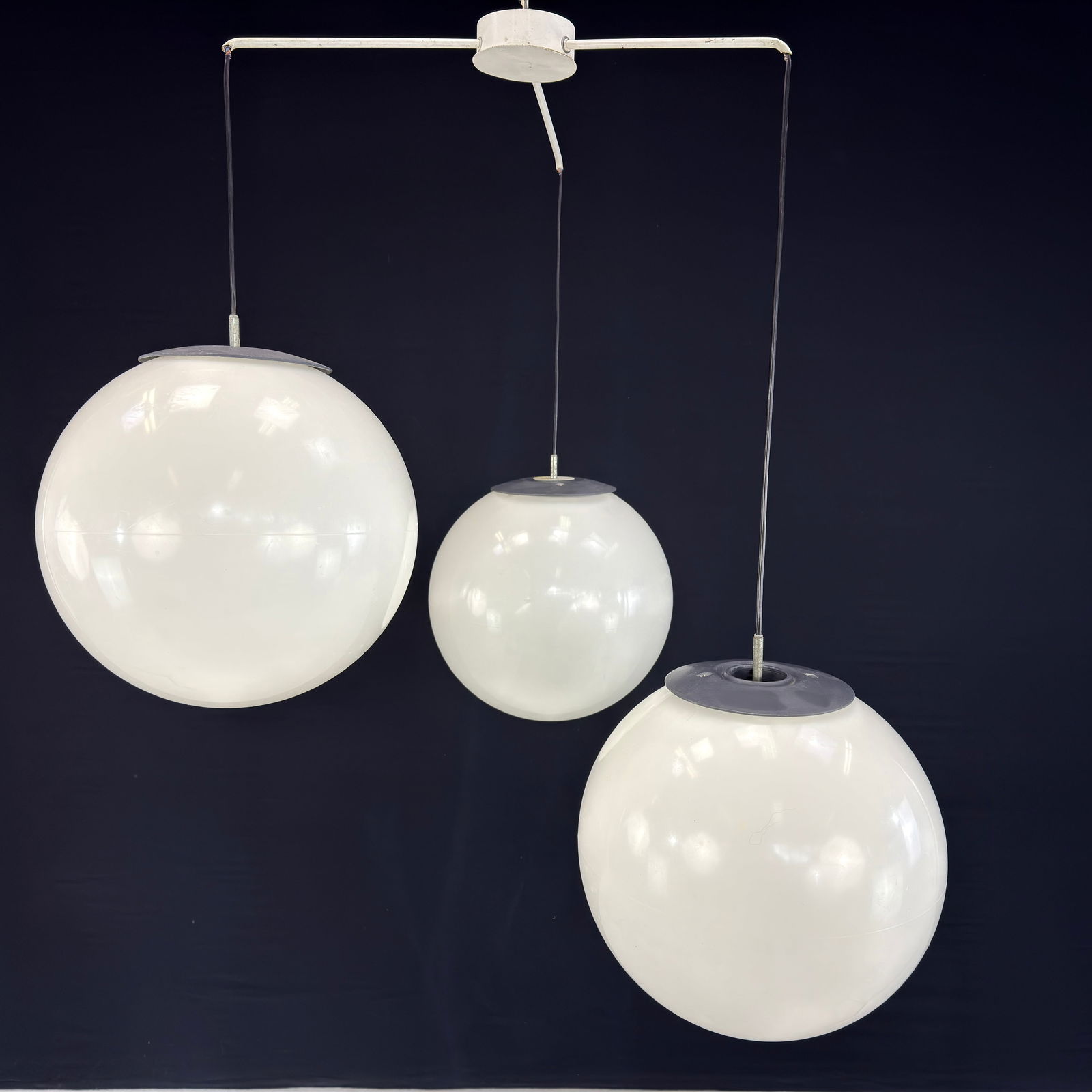 EUROLICHT NAARDEN PENDANT LIGHT: Dimensions: H 44.5” x W 15”. Vintage Dutch Space Age pendant light by Eurolicht Naarden featuring 3 white glass globes.