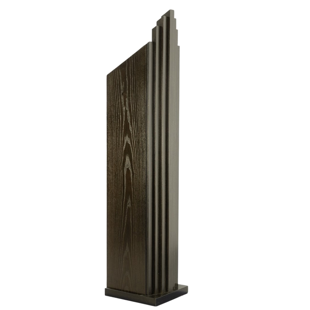 BRUTALIST SKYSCRAPER CABINET, 1990s: Dimensions: H 82” x W 17” x D 18.5”. Vintage brutalist black cabinet “Skyscraper” with 9 shelves inside.