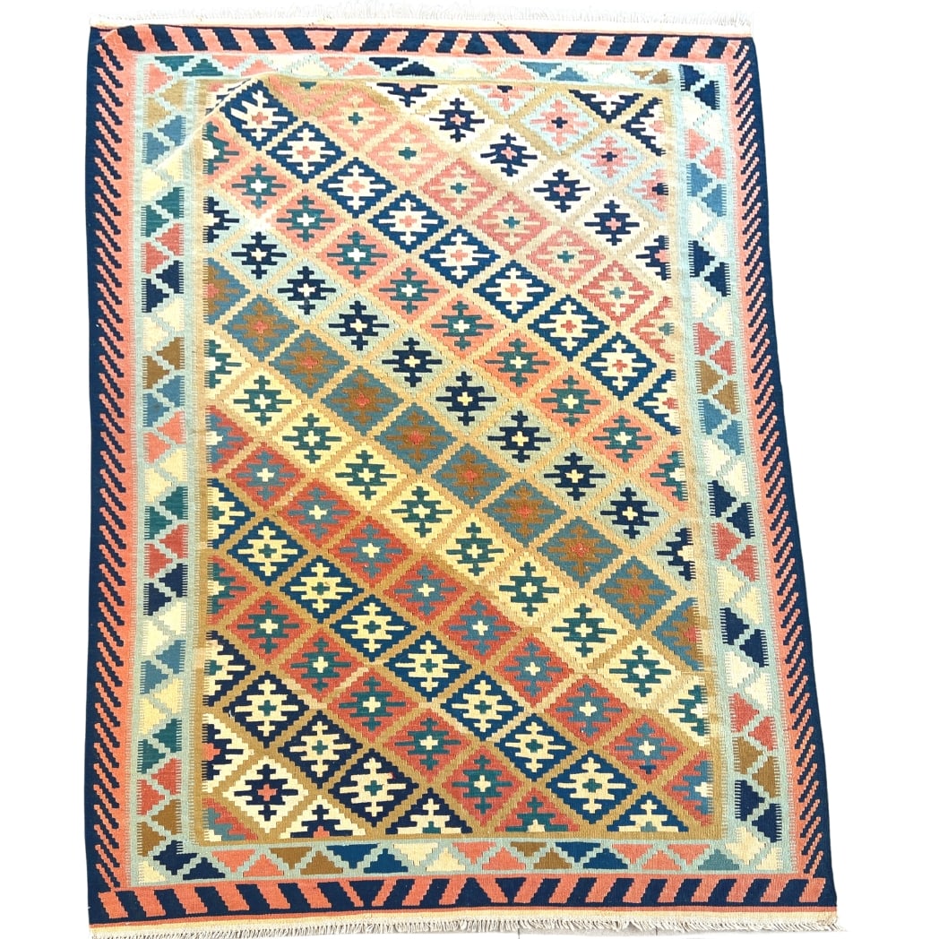 TRIBAL PERSIAN KILIM RUG: Dimensions: H 8'7" x W 5'6". Hand knotted Tribal Persian kilim rug with geometric pattern.