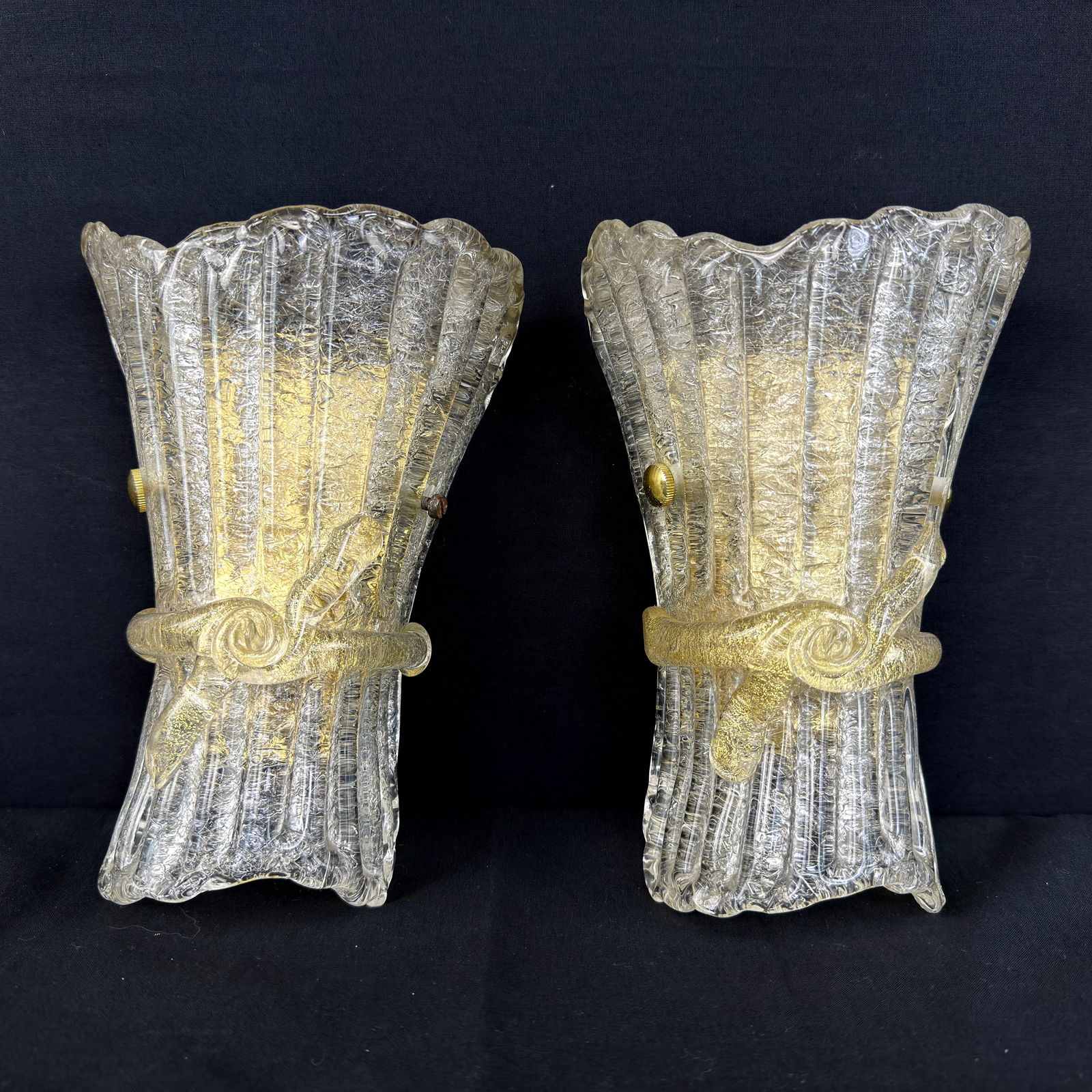 MURANO GLASS WAL SCONCES ATTR.TO ITALAMP, A PAIR: Dimensions: H 9” x W 6.3”. Pair of Italian hand blown Murano glass wall sconces with brass frame attr. to Italamp.