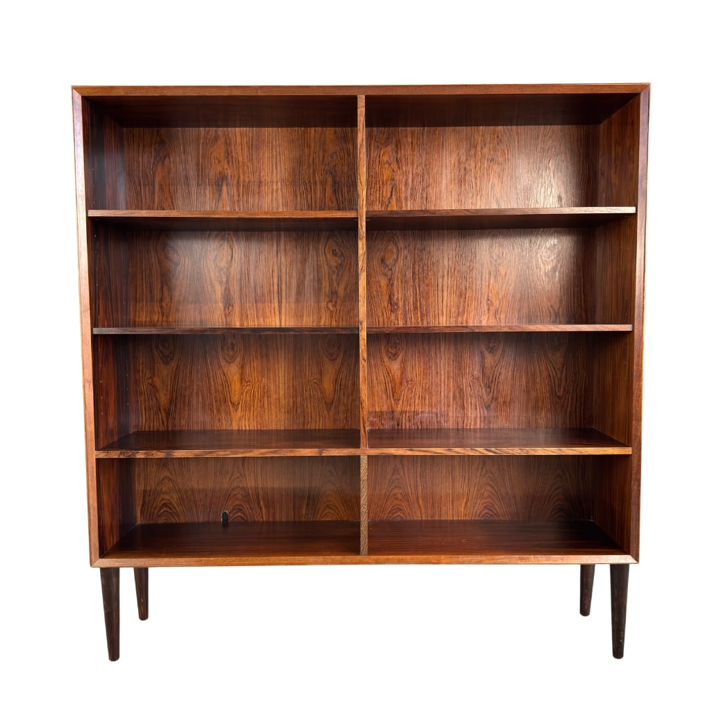 EDMUND BROUER ROSEWOOD BOOKCASE: Dimensions: H 55.5” x W 53.3” x D 12”. Danish Edmund Brouer rosewood bookcase produced by Brouer Mobelfabrik in the 1970s with 6 removable shelves.
