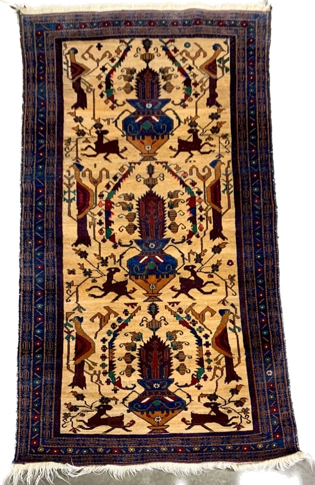 FINE TURKISH WOOL RUG: Dimensions: H 6'10" x W 3'3". Vintage Turkish wool rug with animal scenes. Unique design and vivid colors. Mid to late 20th century.