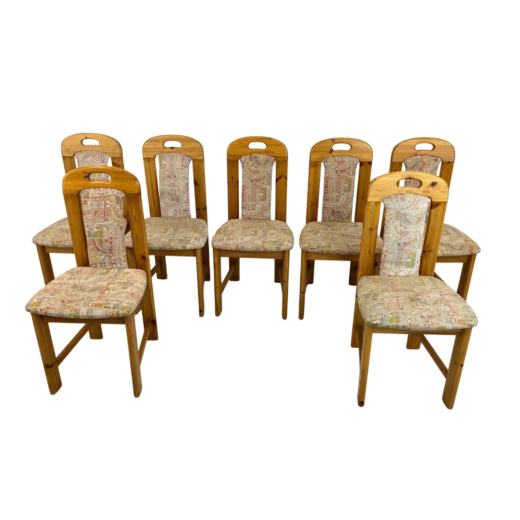 (7) SCANDINAVIAN PINE DINING CHAIRS: Dimensions: H 36” x W 17.5” x D 19” x SH 18.5”. Set of 7 Vintage Scandinavian pine dining chairs, upholstered in original multi-colored fabric.